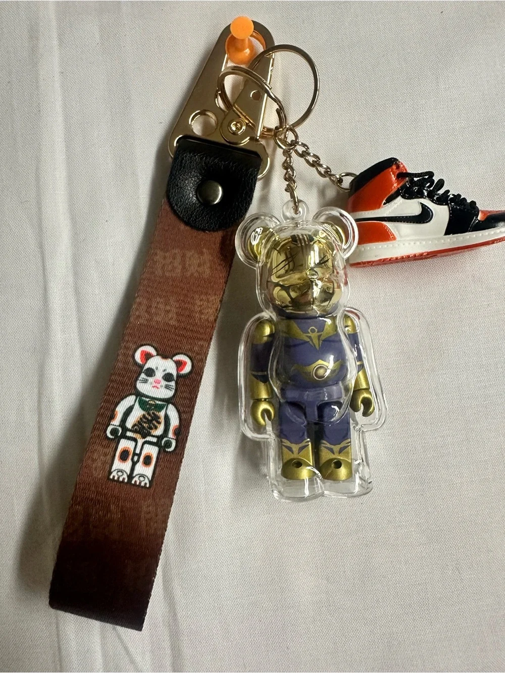 Gold & Purple Bear Keychain with Orange-Black Sneaker Charm